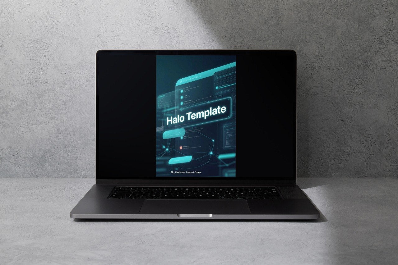 A dark gray laptop sits open on a light gray surface against a textured gray wall, with its screen displaying a digital template graphic that reads 'Halo Template'.